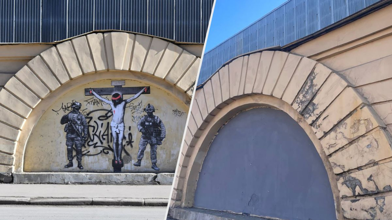 Antikriegs-Graffiti mit dem gekreuzigten Jesus und Sicherheitskräften, gemalt in St. Petersburg