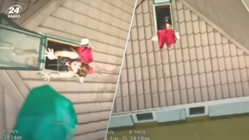 TrO-Krieger überreichte einer Mutter mit Kindern auf dem Dach im überschwemmten Oleshki Essen per Drohne: beeindruckendes Filmmaterial