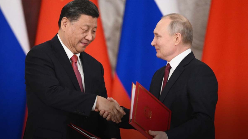 Eine freundliche Geste aus China: Warum hat Putin eine große Delegation nach Xi Jinping mitgenommen